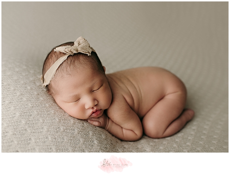 Calgary newborn photo baby girl in tushy up pose